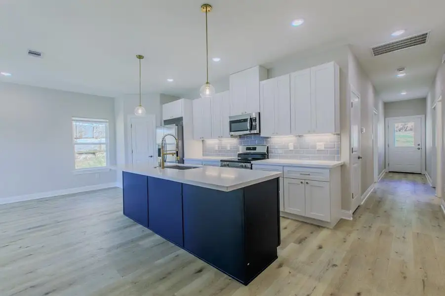 Furnished interior view inside a new home in , West (Image 9).