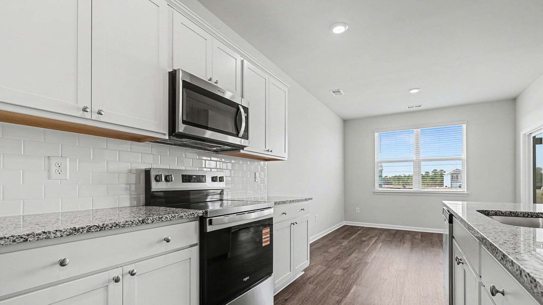 Furnished interior view inside a new home in Preserve at Cypress Commons, Conway (Image 4).