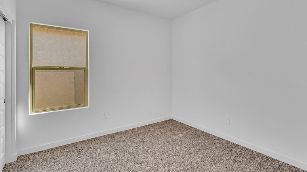 Representative unfurnished interior of a home built from the Parker by D.R. Horton in The Oasis at Rocking K, Vail (Image 37).