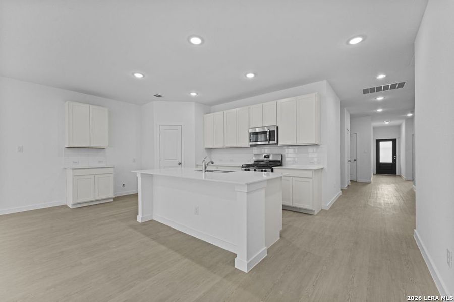 Furnished interior view inside a new home in Sky Ranch, New Braunfels (Image 6).
