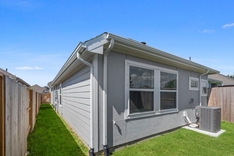 Exterior details and patio area of a home in Meridiana, Iowa Colony (Image 3). Exterior details and patio area of a home in Meridiana, Iowa Colony (Image 3).