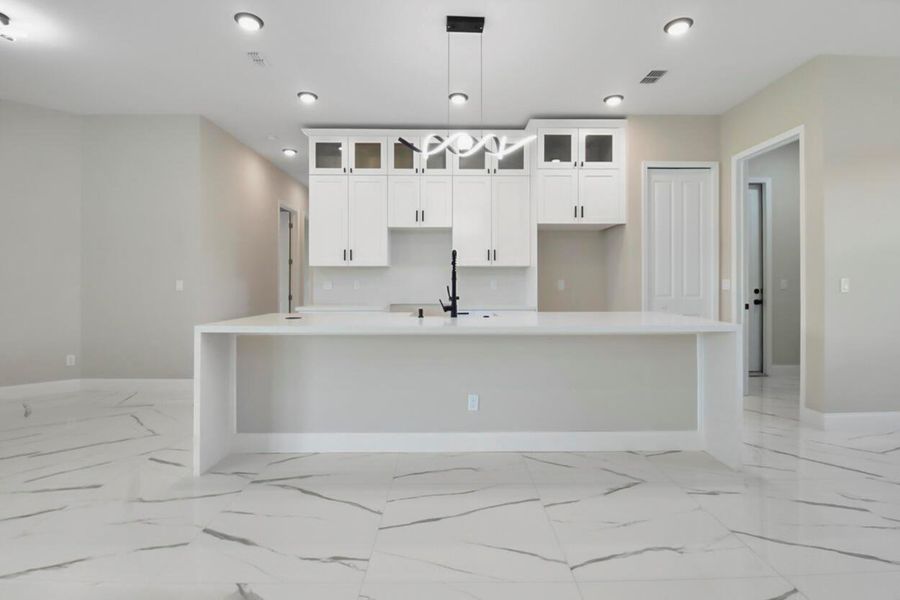 Furnished interior view inside a new home in , Port St. Lucie (Image 13).