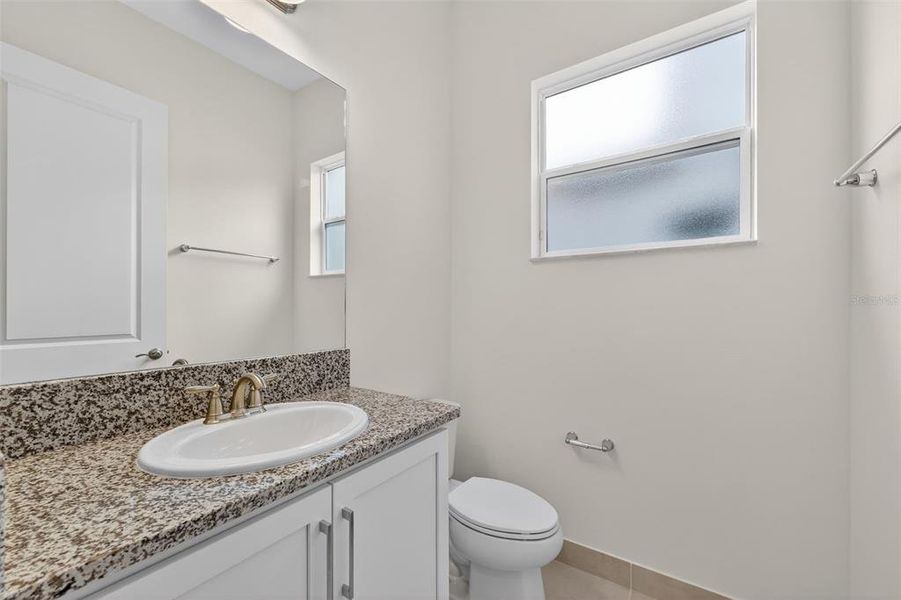Furnished interior view inside a new home in Winding Ridge, Wesley Chapel (Image 10).