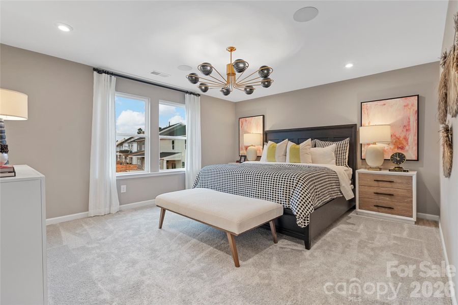 Primary Suite complete with modern furnishings.