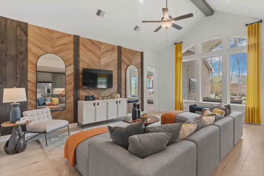 Representative furnished interior of a home built from the Stafford by Chesmar Homes in Prominence 60's, San Antonio (Image 5).