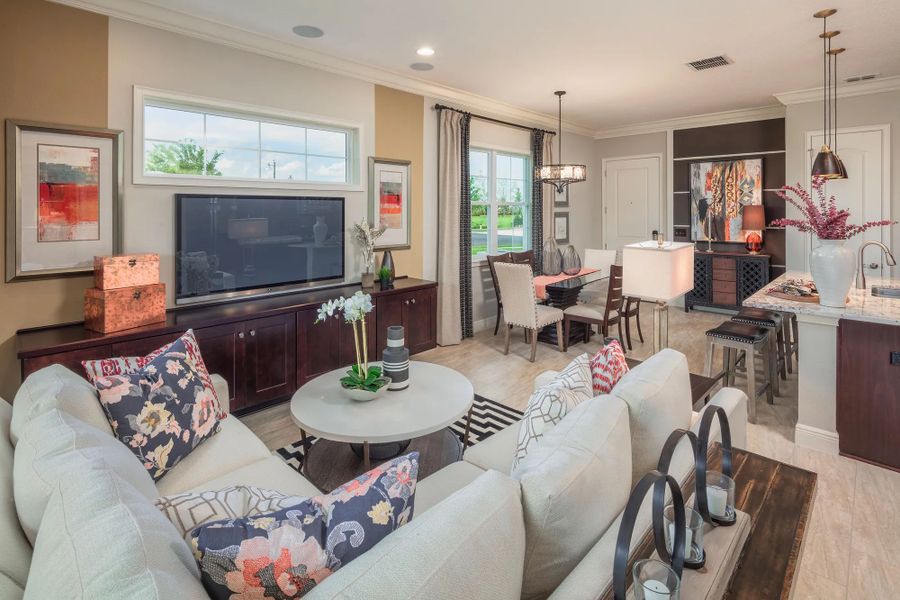 Representative furnished interior of a home built from the Daytona by Jones Homes USA in Twin Lakes, St. Cloud (Image 4).