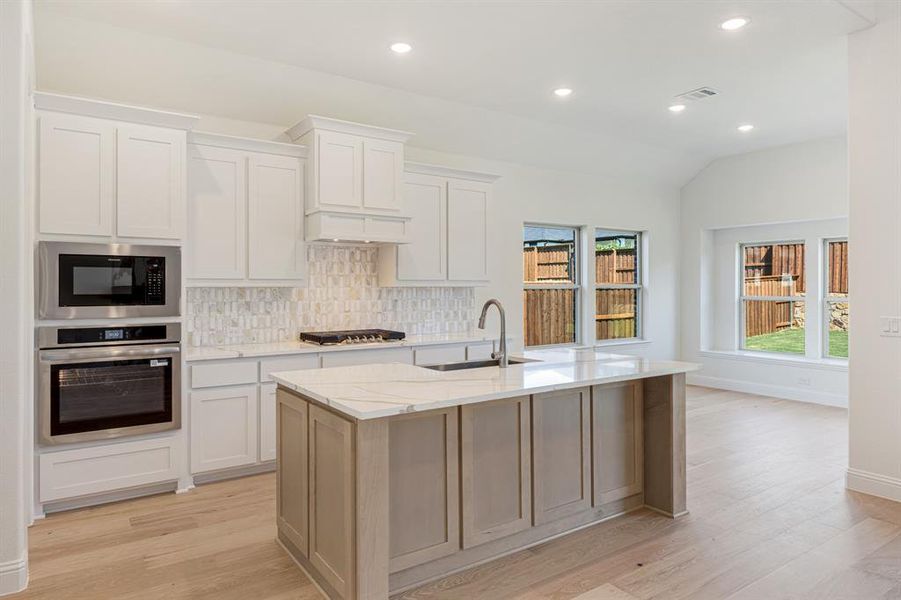 Furnished interior view inside a new home in Windsong Ranch Classic 61, Prosper (Image 8). Furnished interior view inside a new home in Windsong Ranch Classic 61, Prosper (Image 8).