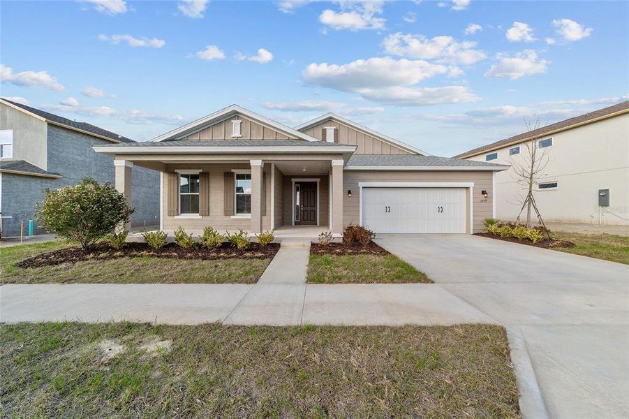 Front exterior of a new home in Calesa Township, Ocala, FL, highlighting curb appeal (Image 19).