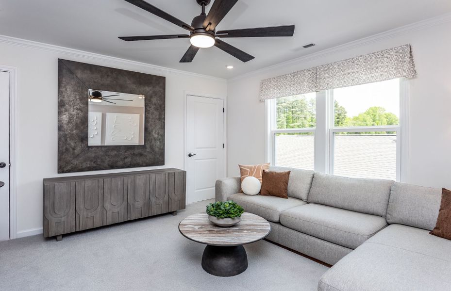 Representative furnished interior of a home built from the Compass by Del Webb in Del Webb at Chatham Park, Pittsboro (Image 10).