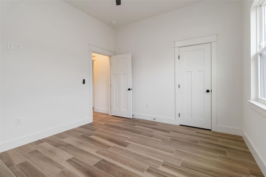 Secondary bedroom facing front of home Secondary bedroom facing front of home