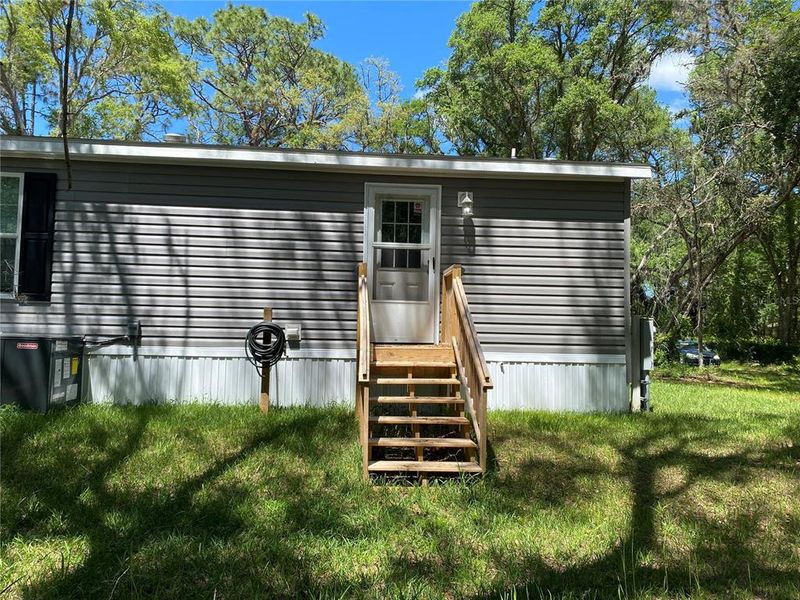 Exterior details and patio area of a home in , Webster (Image 14).