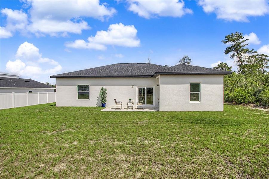Exterior details and patio area of a home in , Ocala (Image 4).