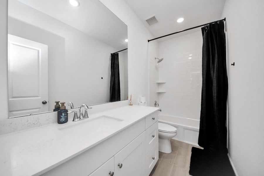 Furnished interior view inside a new home in The Trails, New Caney (Image 9).