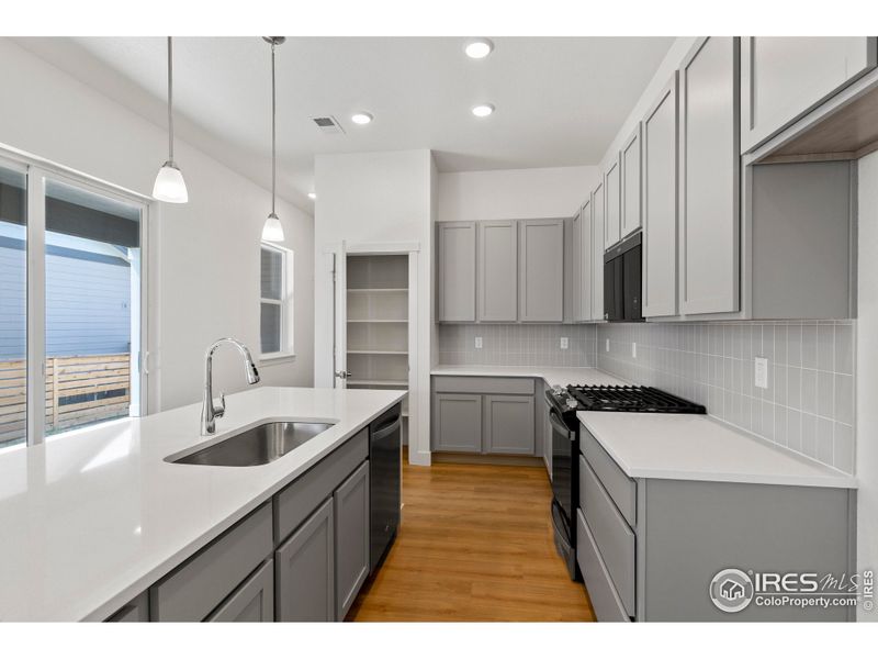 Furnished interior view inside a new home in Trailside on Harmony, Timnath (Image 6).