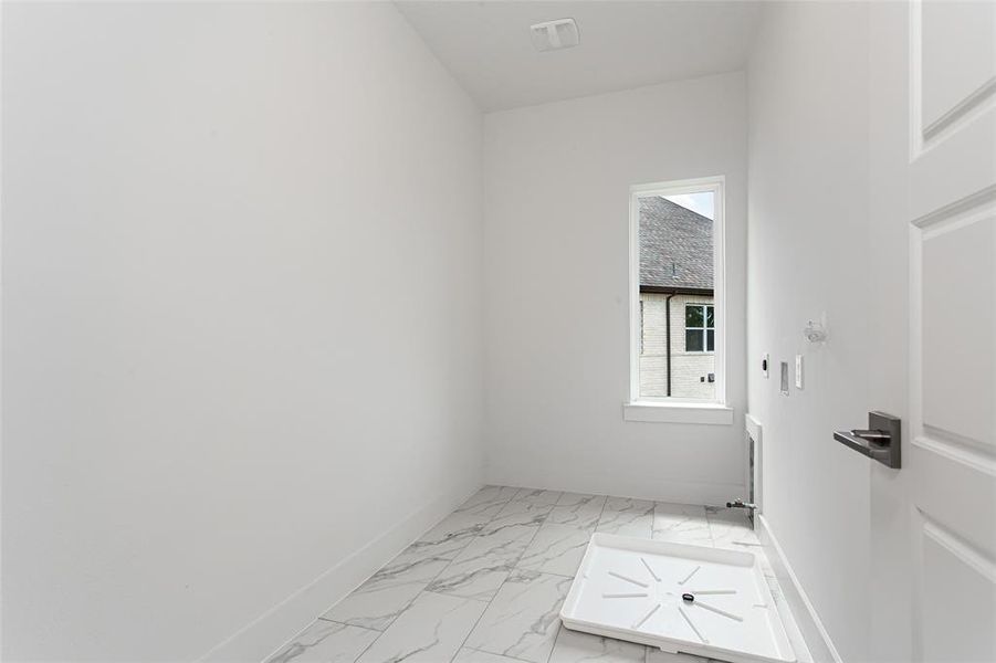 View of tiled spare room