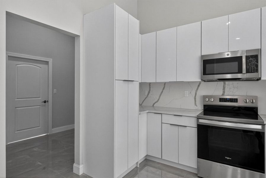 Furnished interior view inside a new home in , The Acreage (Image 14). Furnished interior view inside a new home in , The Acreage (Image 14).