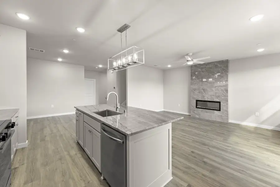 Furnished interior view inside a new home in Wildridge, Oak Point (Image 7).