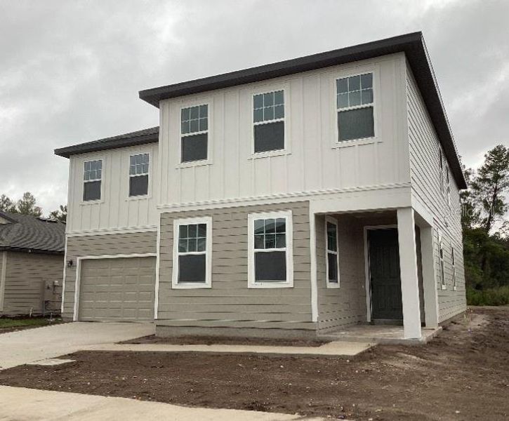 Exterior details and patio area of a home in Ellington Traditional, St. Cloud (Image 17).
