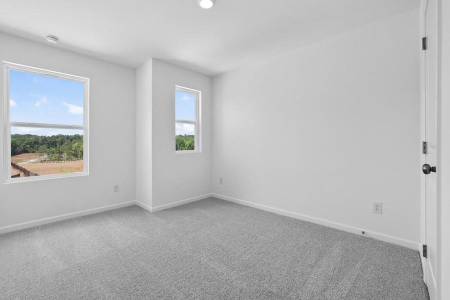 Spacious, unfurnished interior of a new home in Weatherfield, Buford (Image 32).