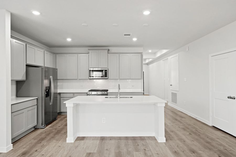 Furnished interior view inside a new home in Sunterra, Katy (Image 10). Furnished interior view inside a new home in Sunterra, Katy (Image 10).