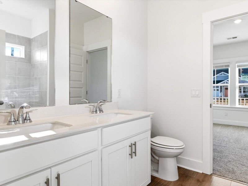 Furnished interior view inside a new home in The Coves at Lakes of Cane Bay, Summerville (Image 17). Furnished interior view inside a new home in The Coves at Lakes of Cane Bay, Summerville (Image 17).