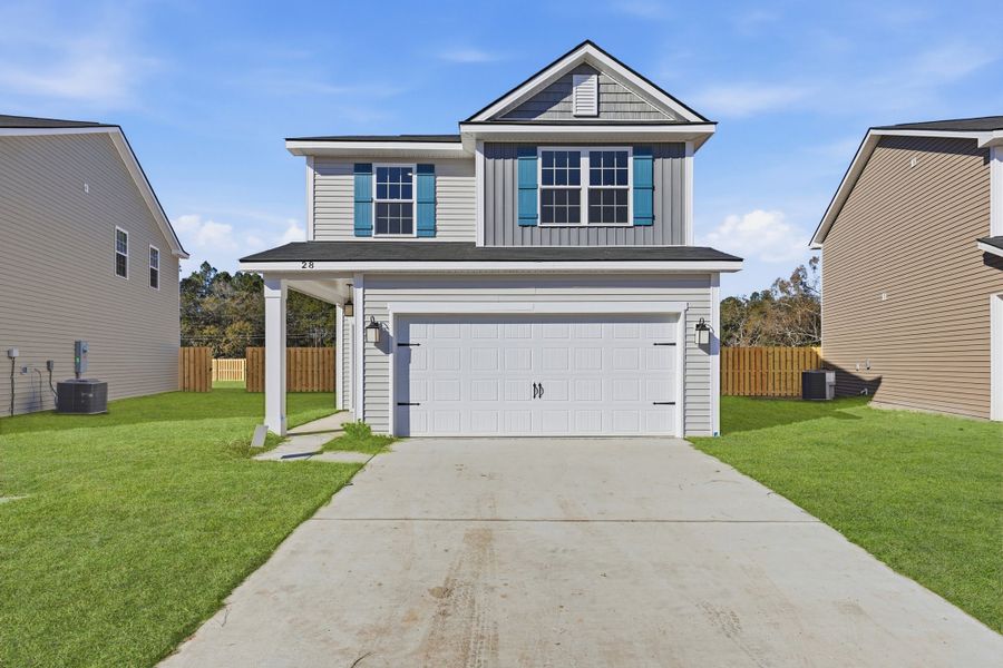 Representative exterior photo of a completed home built from the The Porter by RTS Homes in Grand Reserve, Hinesville, GA (Image 18).