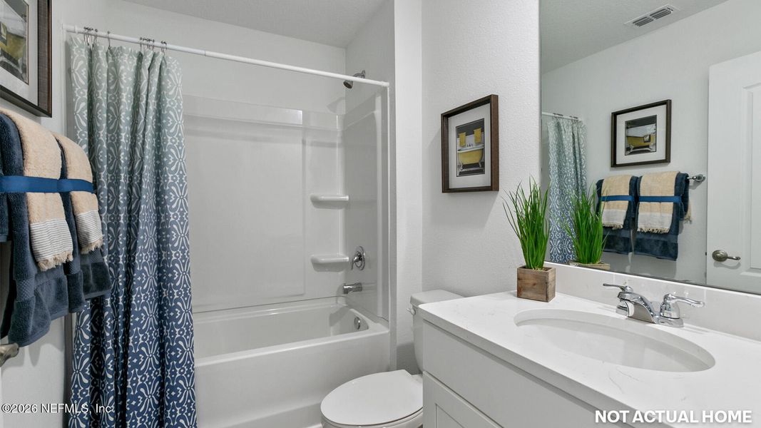 Furnished interior view inside a new home in American Village, Palm Coast (Image 5).