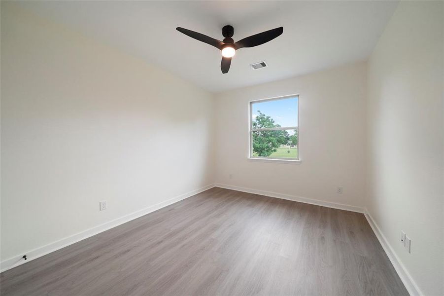 First guest bedroom on the second floor.