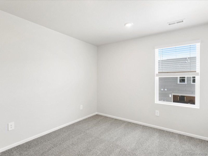 Spacious, unfurnished interior of a new home in Poudre Heights: The Meadow Collection, Windsor (Image 31).