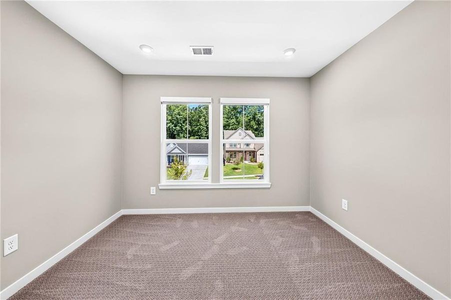 Spacious, unfurnished interior of a new home in The Reserve At Liberty Park, Braselton (Image 41).