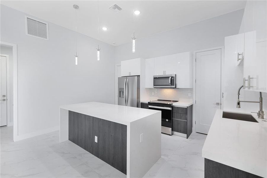 Furnished interior view inside a new home in , Port Charlotte (Image 6). Furnished interior view inside a new home in , Port Charlotte (Image 6).