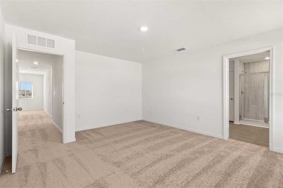 Spacious, unfurnished interior of a new home in Peach Crossings, Winter Haven (Image 22).