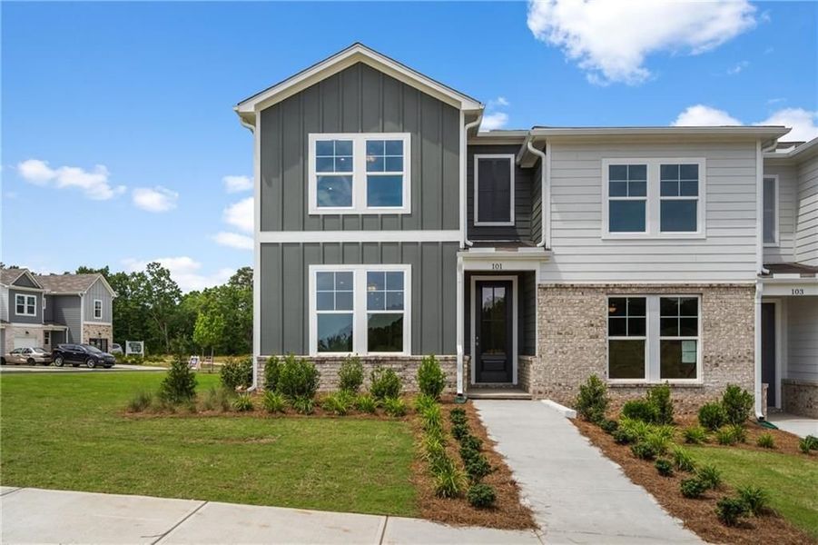 Front exterior of a new home in Stegall Village, Emerson, GA, highlighting curb appeal (Image 1). Front exterior of a new home in Stegall Village, Emerson, GA, highlighting curb appeal (Image 1).