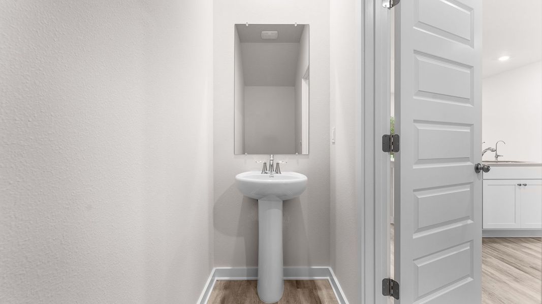 Furnished interior view inside a new home in Genoa Landing Townhomes, Freeport (Image 11).