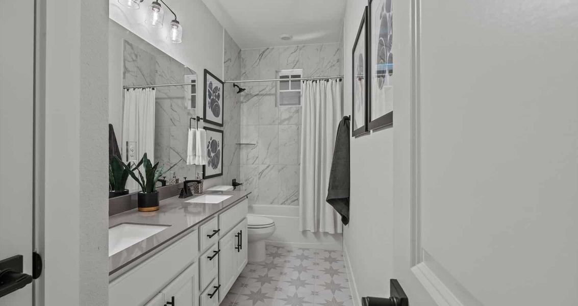 Furnished interior view inside a new home in 6 Creeks, Kyle (Image 17).