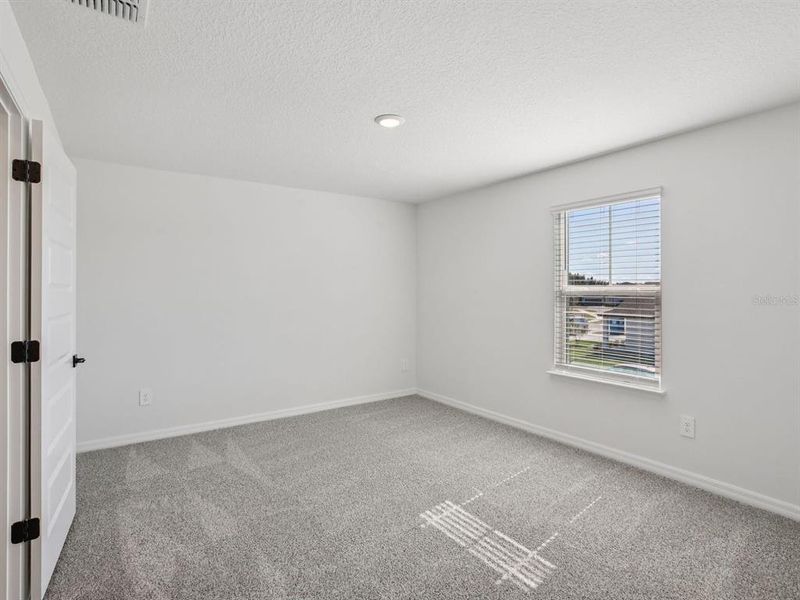 Spacious, unfurnished interior of a new home in Two Rivers - Signature Series, Zephyrhills (Image 19).