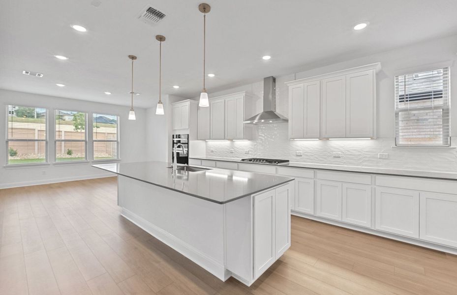 Furnished interior view inside a new home in Bluffview Reserve, Leander (Image 8).