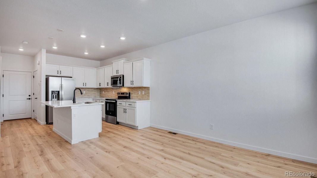 Furnished interior view inside a new home in Horizon Uptown, Aurora (Image 15). Furnished interior view inside a new home in Horizon Uptown, Aurora (Image 15).