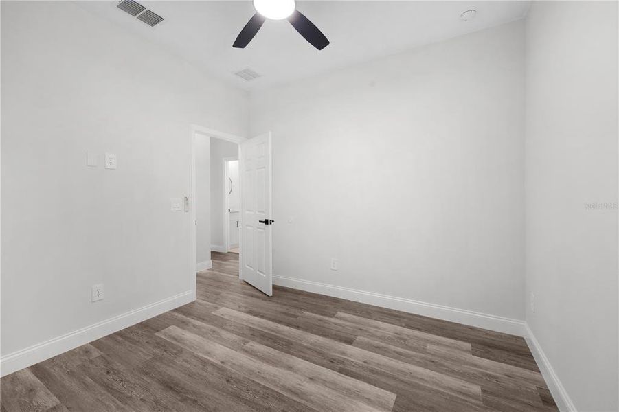 Spacious, unfurnished interior of a new home in , Port Charlotte (Image 26).