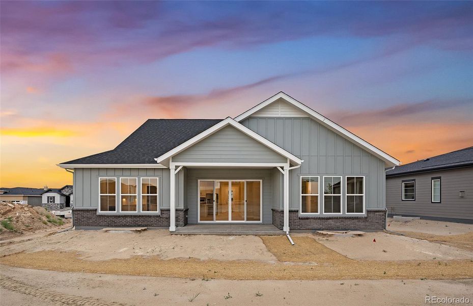 Front exterior of a new home in Hilltop at Inspiration, Aurora, CO, highlighting curb appeal (Image 29).