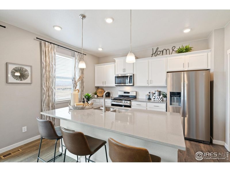 Furnished interior view inside a new home in Fossil Creek Ranch, Windsor (Image 15).