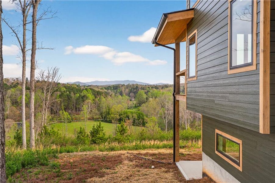 Exterior details and patio area of a home in , Ellijay (Image 28).
