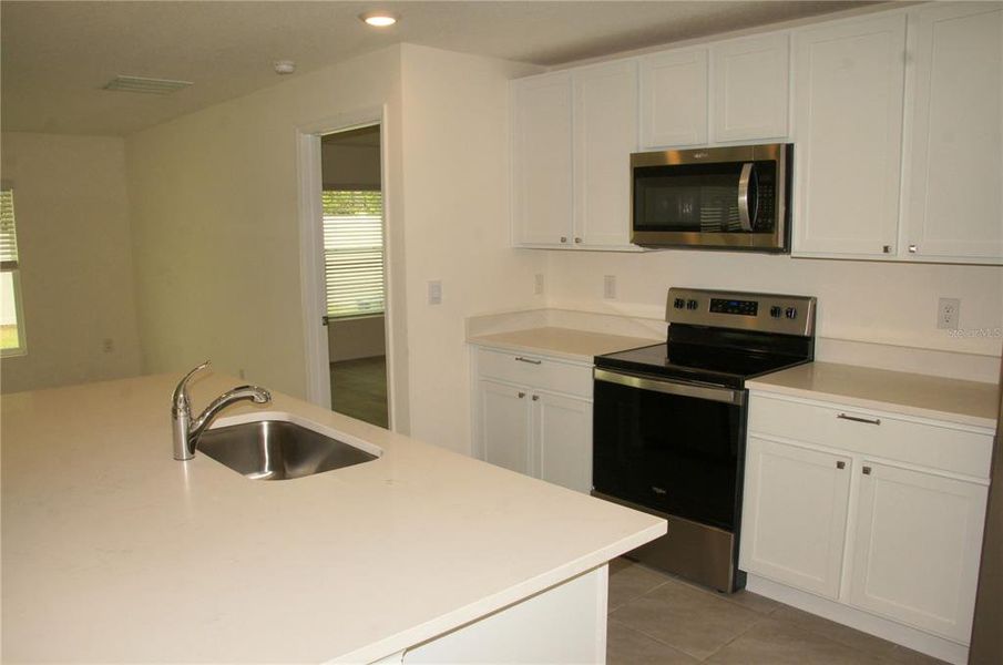Furnished interior view inside a new home in Deer Path, Ocala (Image 8). Furnished interior view inside a new home in Deer Path, Ocala (Image 8).