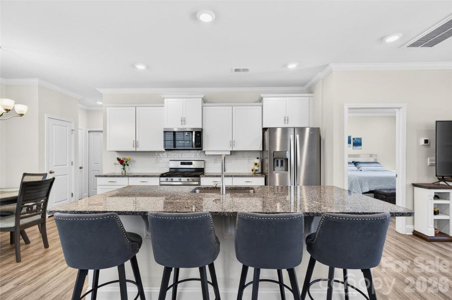 Large center island. Room for 4 stools. Great breakast bar, buffet area or prep area.