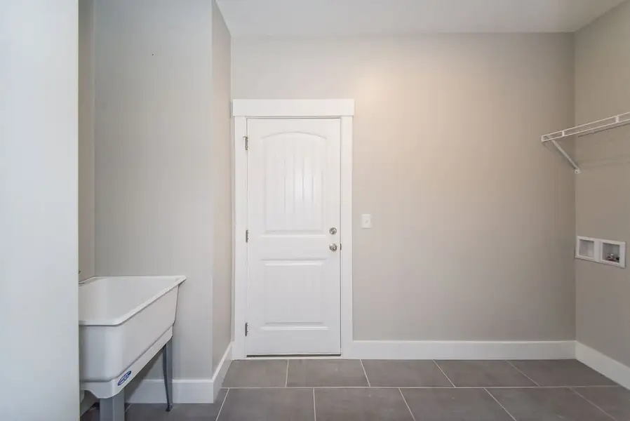 Representative unfurnished interior of a home built from the Beaumont Elite by Enchanted Homes in Smokey Hills, Campobello (Image 50).