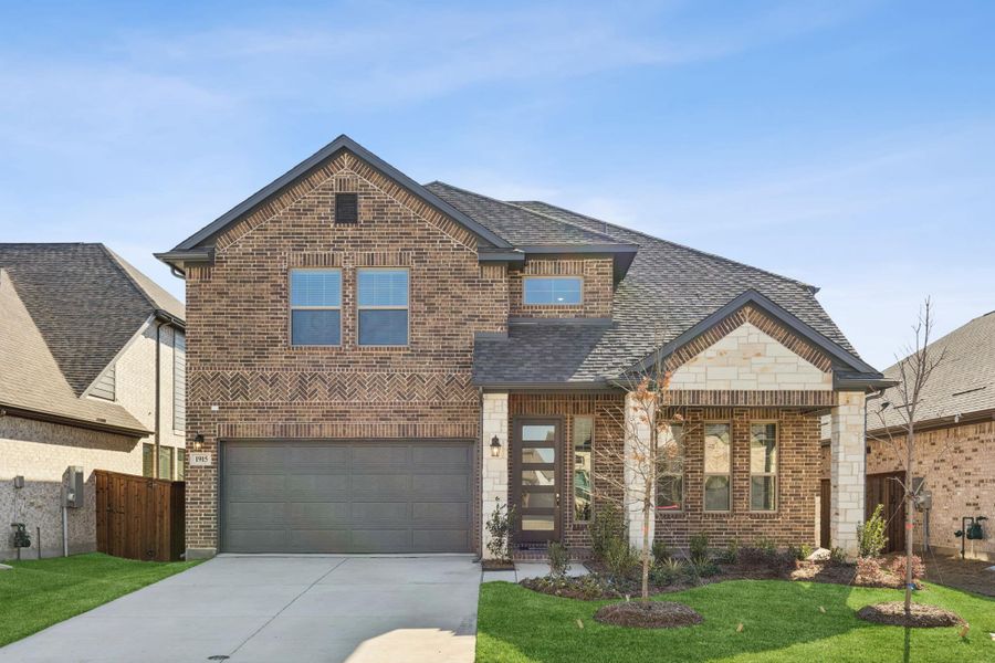 Front exterior of a new home in Las Lomas, Forney, TX, highlighting curb appeal (Image 16).