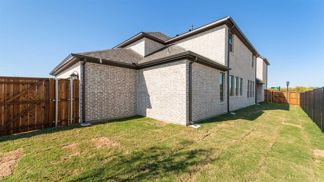 Exterior details and patio area of a home in The Heights At Uptown Celina 45', Celina (Image 2).