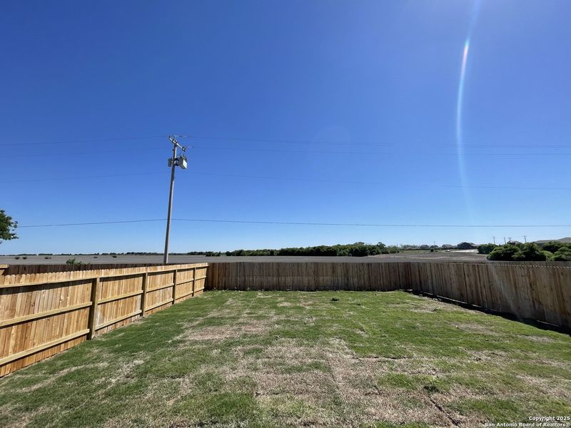 Exterior details and patio area of a home in Whisper Falls, San Antonio (Image 11).