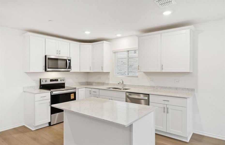 Kitchen with eat-in island Kitchen with eat-in island