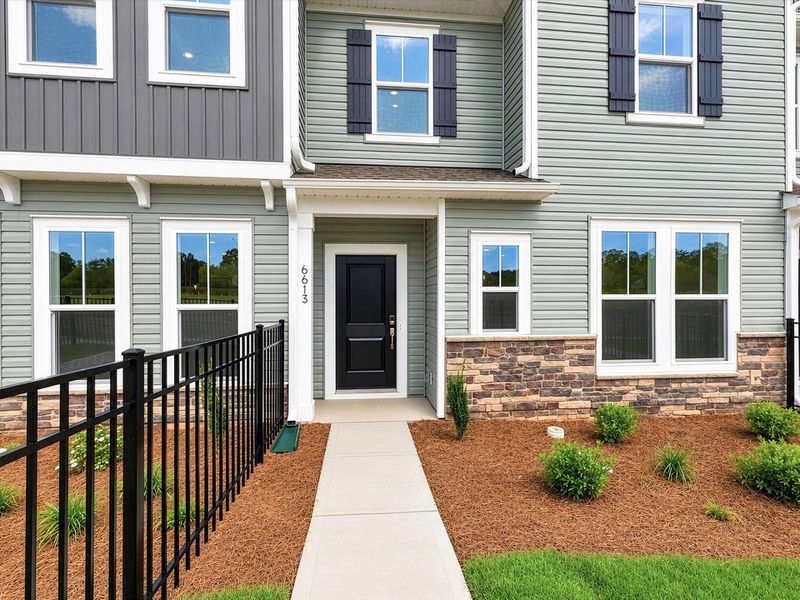 Exterior details and patio area of a home in Westwood Reserve, Charlotte (Image 4). Exterior details and patio area of a home in Westwood Reserve, Charlotte (Image 4).